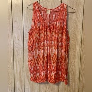 Sleeveless blouse with tassel detail